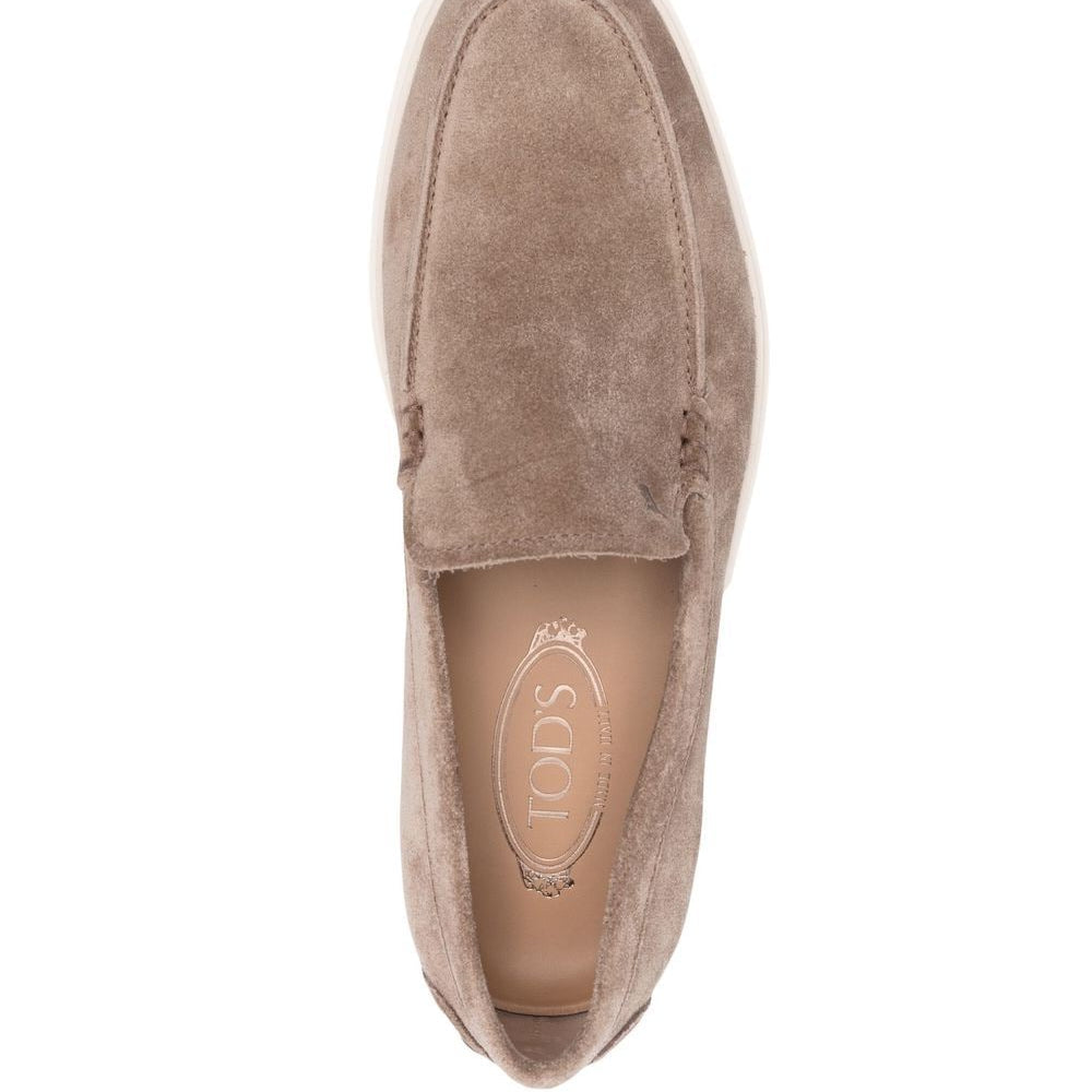 
                  
                    Tod's Slip-on loafers
                  
                