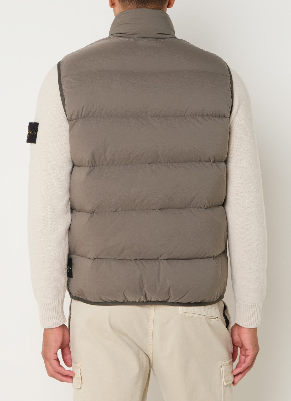 STONE ISLAND - PADDED GILET WITH DOWN FILLING AND ZIP POCKETS.