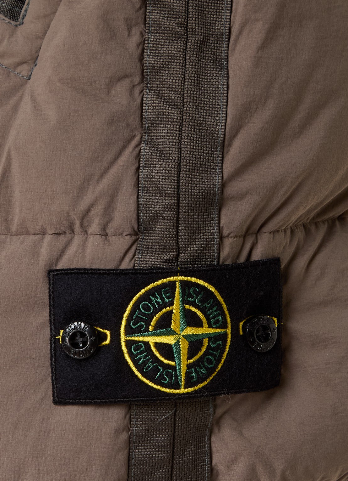 STONE ISLAND - PADDED GILET WITH DOWN FILLING AND ZIP POCKETS.