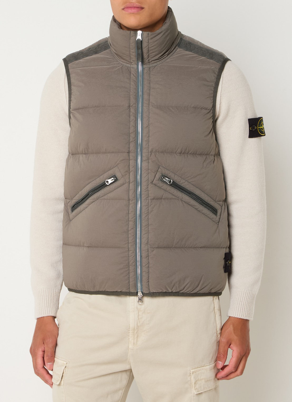 STONE ISLAND - PADDED GILET WITH DOWN FILLING AND ZIP POCKETS.